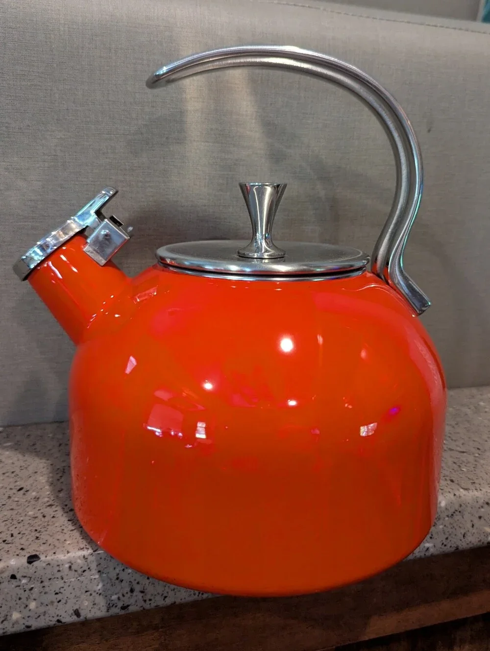 Kate Spade Orange Whistling Tea Kettle with Polished Silver Accents